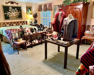 LARGE MASTER BEDROOM WITH SO MANY WOMEN'S CLOTHING!  