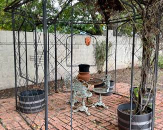 LARGE PATIO INCLUDING THIS FABULOUS METAL GAZEBO.  POTTED WISTERIA ALSO FOR SALE!  NOTICE THE VINTAGE CAST IRON PATIO CHAIRS AND TABLE.