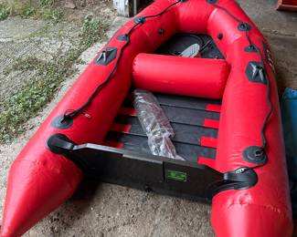 Inflatable Dingy With Motor. Has a leak. 