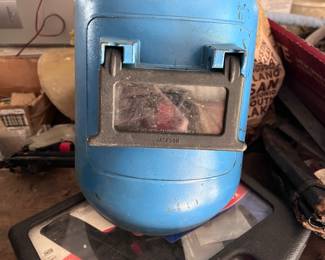 Several welding helmets