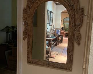 Appears to be an antique mirror that has been paint distressed