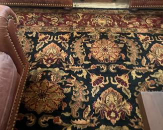 2 leather chairs and couch and gorgeous rug 
