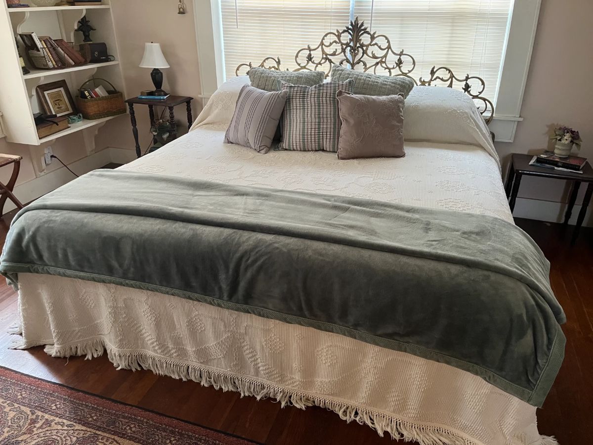 King bed with antique headboard