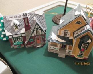 Dept 56 in Boxes w/ light cords.  "Oak Grove Tudor" and "Woodbury House" . Sold separately.