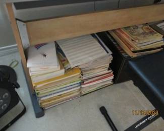 Music books for keyboard and guitar.