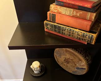 Books and Art work on Shelf