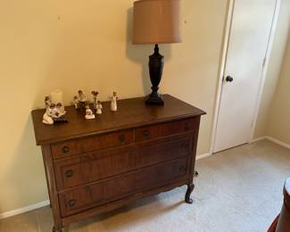 Antique Dresser with Figurines and lamp