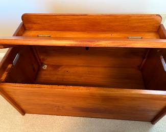 Wood box with top opened.  Depth about 14 inches