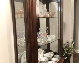 Curio cabinet with side entries 