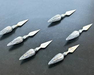 Sterling corn cob holders 