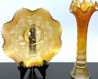 Antique Carnival Glass in Marigold.
 The bowl is by Northwood 