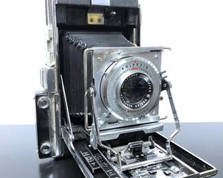 Polaroid Pathfinder 110 Land Camera .......To register in order to place bids go to www.capitolsalesservices.hibid.com