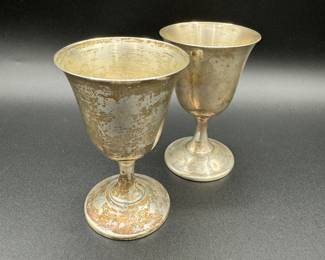 $80 	
Pair sterling wine cups 4.26 oz	