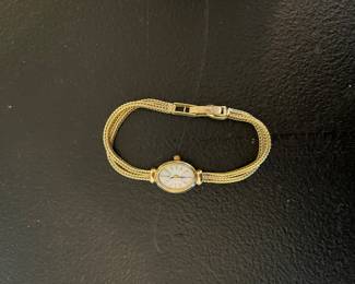 CYMA 14kt gold watch $495