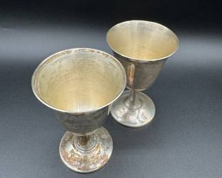 $80 	
Pair sterling wine cups 4.26 oz	