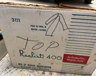 1950's Realist 400 Slide Projector with slide trays. Original box, in working condition    $40