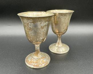 $80 	
Pair sterling wine cups 4.26 oz	