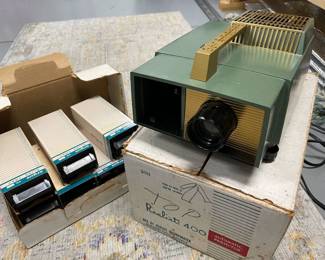 1950's Realist 400 Slide Projector with slide trays. Original box, in working condition    $40