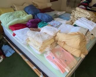 Bed linens, duvets and more atop MCM Danish platform bed