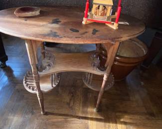 Antique Victorian side table with decorative accents 