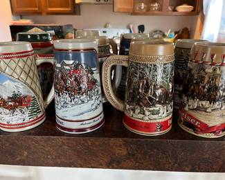 Collection of Budweiser steins (17 total).