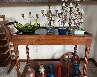 Vintage tea cart with glass top; sale full of quality collectibles, decor and curiosities from around the world.