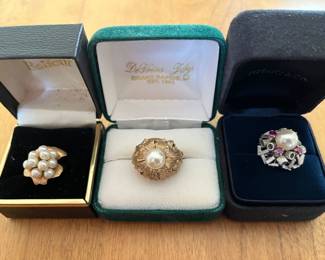 Three 14k gold rings.