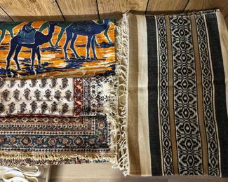 Numerous genuine rugs/textiles from around the world.
