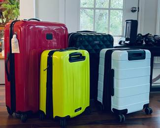 New and just like new Tumi luggage
