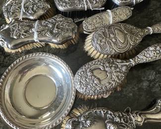 Sterling.  Lots of vintage sterling art nouveau