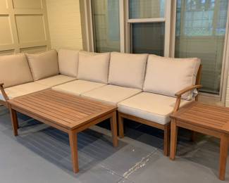 9 ft.Sectional Sofa with beige pillows,  Coffee table and end table