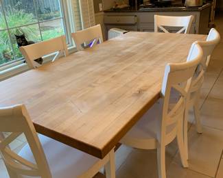 Butcher Block Table/6 chairs  white chairs are wood and purchased at Crate & Barrel