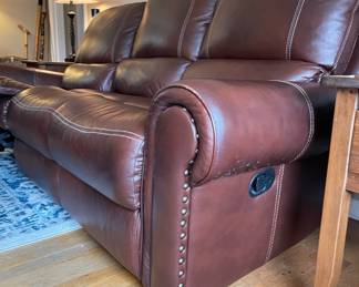 #66 3 seat leather couch with reclining seats 90x36 $ 200.00