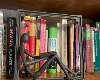 #21 Danya B Modernist cast iron sculpture - reading man in window 9" $ 25.00