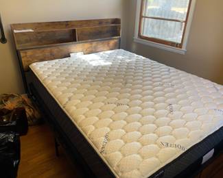 #54 Wood and metal Queen Size bed frame - headboard has power outlets and 2 shelves 62x46 (like new) $ 125.00