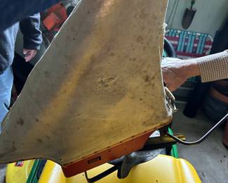 Old seed bag strap it across your chest seed goes in the bag then there is a crank that spits the seeds out