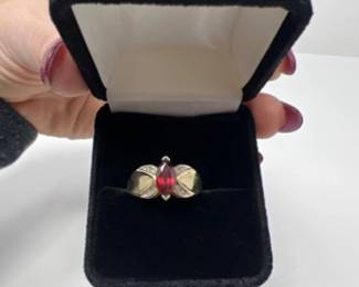 10K Gold Ring Adorned with a Rich Garnet & Diamond Accents