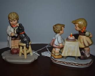 Many of these are Berta Hummel's. Berta Hummel items are produced in the Far East (in China and Thailand) instead of Germany, but they are also under the supervision and scrutiny of the Goebel company. The Berta Hummel produced in China and Thailand are made of bisque porcelain. They are authorized by the Goebel Company in Germany and are completely under Goebel's scrutiny and supervision. They are made of Bisque porcelain to reduce costs instead of the preferred porous earthenware which has to be fired in a kiln a number of times as in Goebel's German factories. These Berta Hummel's are Beautiful, the one on the right is Goebel 1996 (Thailand) BH17 entitled "Wishes Come True"