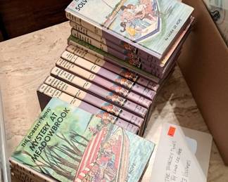Twenty-three volumes of The Bobbsey Twins series