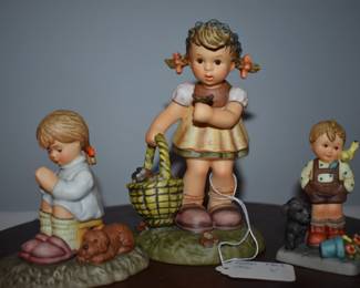 Many of these are Berta Hummel's. Berta Hummel items are produced in the Far East (in China and Thailand) instead of Germany, but they are also under the supervision and scrutiny of the Goebel company. The Berta Hummel produced in China and Thailand are made of bisque porcelain. They are authorized by the Goebel Company in Germany and are completely under Goebel's scrutiny and supervision. They are made of Bisque porcelain to reduce costs instead of the preferred porous earthenware which has to be fired in a kiln a number of times as in Goebel's German factories.