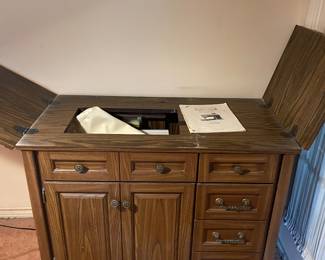 Sewing machine cabinet 