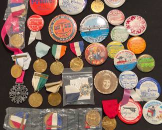 Vintage Winter Carnival And other festival buttons and medals.