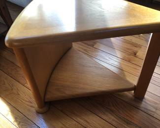 Pie shaped.. triangle table ... end table... between 2 chairs or in the corner