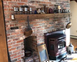 Lots of antique tools & interesting items. Copper forged pans, sad irons, shoe repair lasts & ecological friendly washboard.