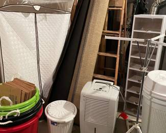 Dehumidifier, indoor/outdoor rug, and beverage bins
