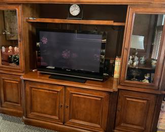 Media Cabinet with bookcase storage glass cabinets on the side and lower cabinets