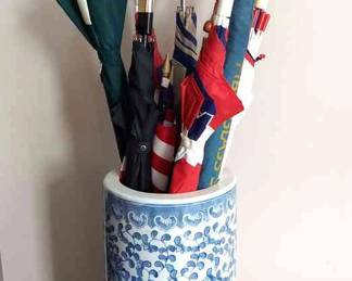 Blue And White Umbrella Stand With Umbrellas