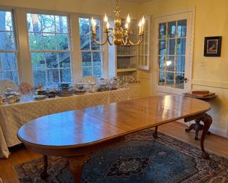 Spanish Clawfoot Oval Dining Table (41"W x 28-1/2"H x 65"L with 2 leaves 18-1/4"L each)