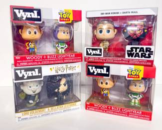 Lot 28 | (4) SEALED Vynl Funkos Including Harry Pottery, Star Wars + Toy Story