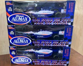 Lot 63 | (3) Sealed Alumax Diecast Cars